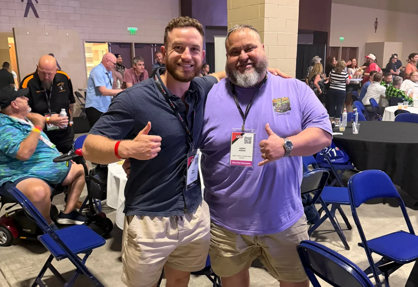 Zach Lejnar of Cart Launch with Rafael Mateo, owner of Happy Trails Custom Carts, at the Golf Carting Expo